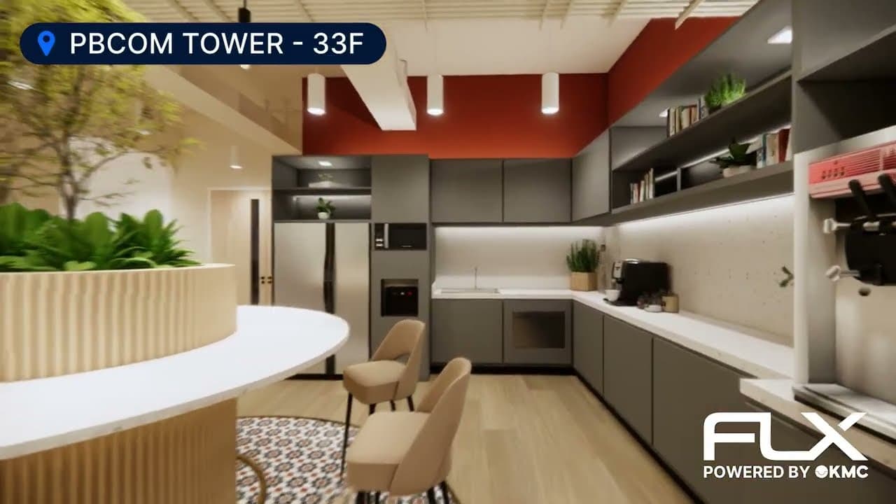 Modern pantry area with sleek cabinets and seating at KMC's office space on the 33rd floor of PBCom Tower, Makati.
