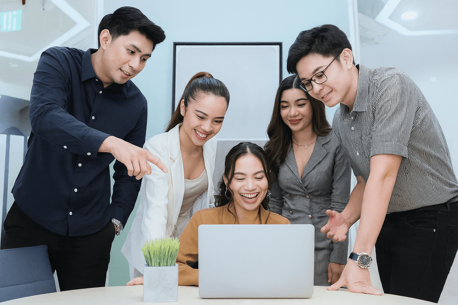 Colleagues at a business lounge discuss strategies, reflecting KMC's commitment to world-class talent and workforce solutions. Colleagues at a business lounge discuss strategies, reflecting KMC's commitment to world-class talent and workforce solutions.