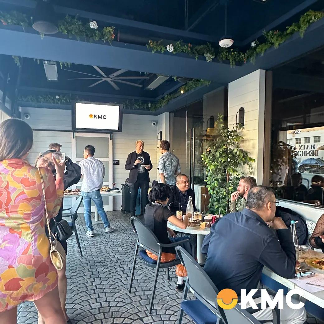 Guests networking at KMC’s Sunset Socials during the US Roadshow, promoting business expansion through partnerships. Guests networking at KMC’s Sunset Socials during the US Roadshow, promoting business expansion through partnerships.