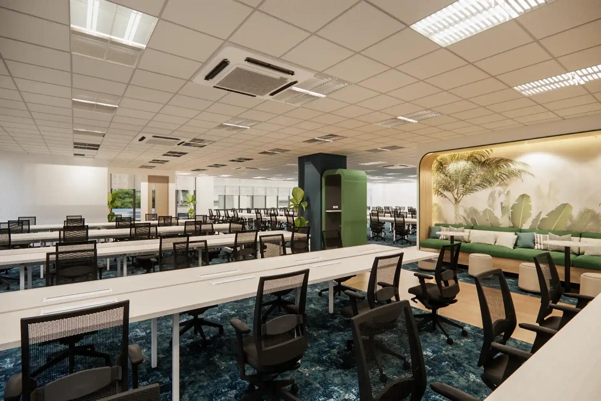 Modern coworking space with open desks, ergonomic chairs, private booths, and lounge seating in a bright, professional office.