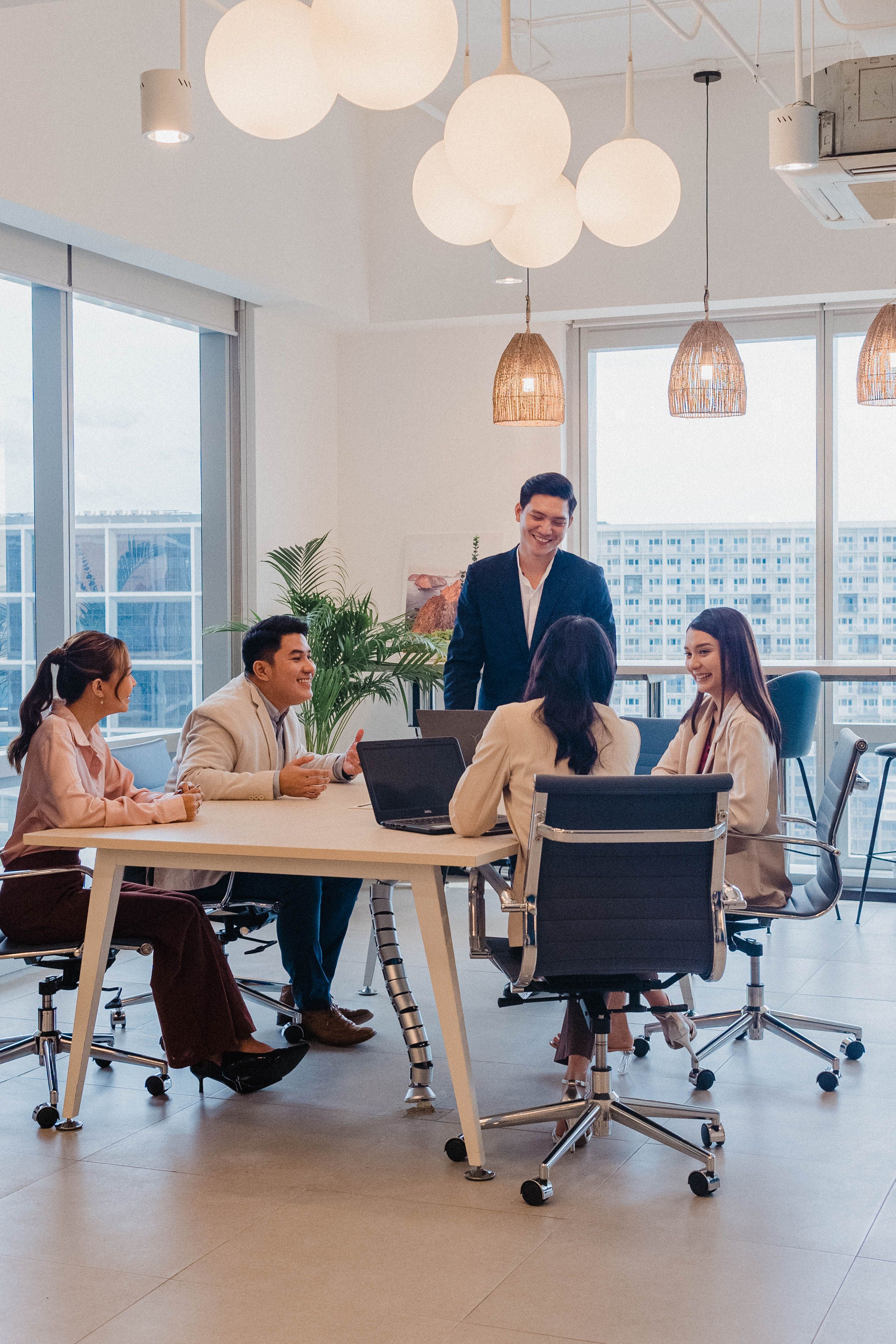 Colleagues at a business lounge discuss strategies, reflecting KMC's commitment to world-class talent and workforce solutions. Colleagues at a business lounge discuss strategies, reflecting KMC's commitment to world-class talent and workforce solutions.