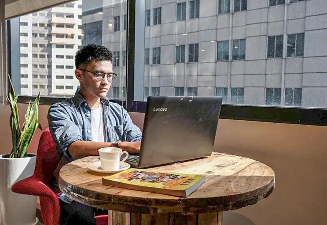 Student working on their laptop Student working on their laptop