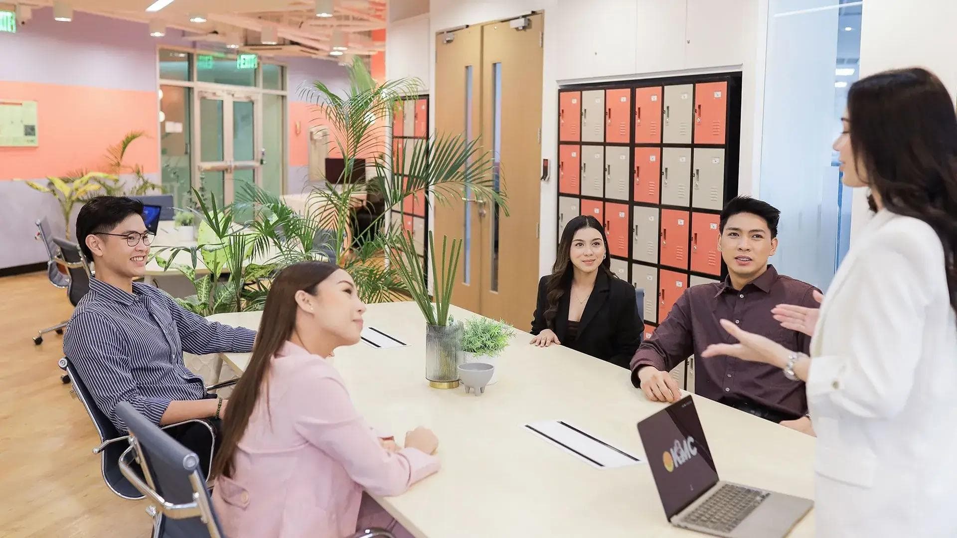 5 people in KMC office space