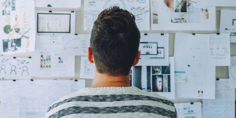 Employee in Front of Office Wall